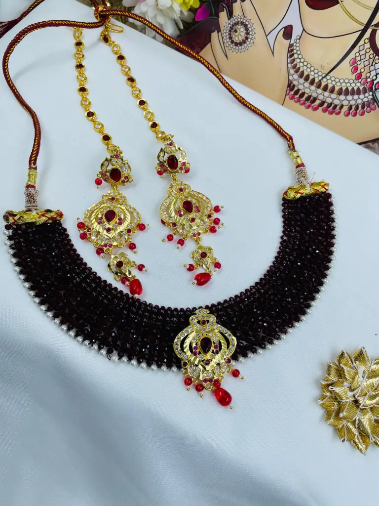 srivalli mehroon set with earing and kanchain